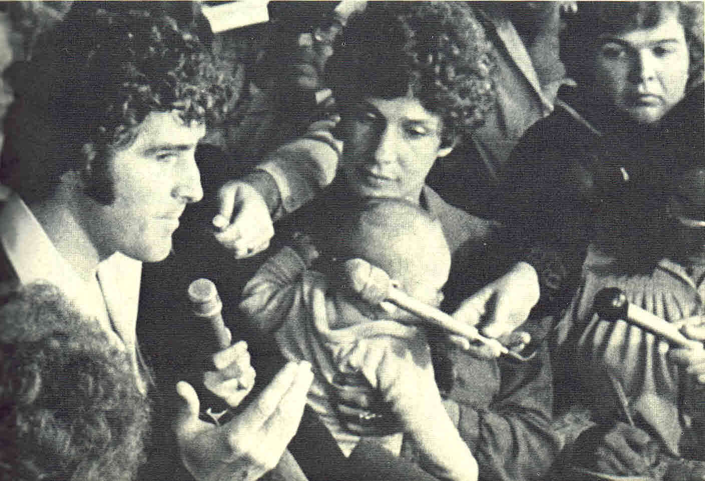 Danny Sheehan surrounded by reporters on courthouse steps, from a UPI news photo