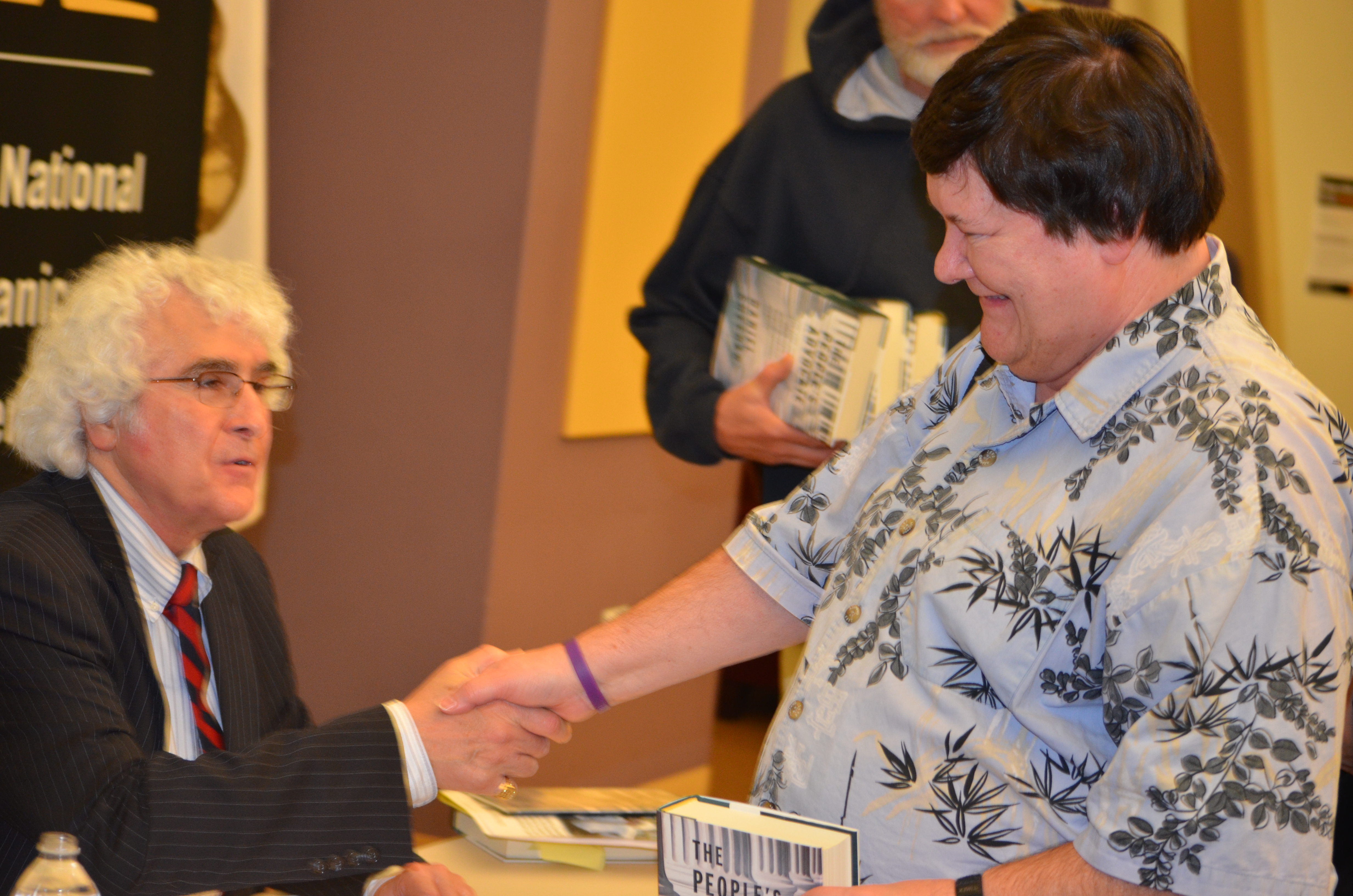 Danny Sheehan greeting an audience member